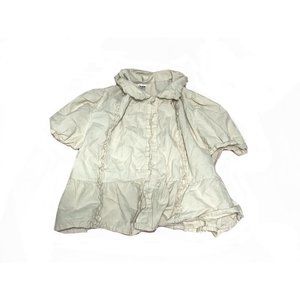 short-sleeved cream blouse